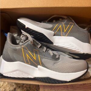 New Balance Gray and Yellow Athletic Shoes with Mesh Design